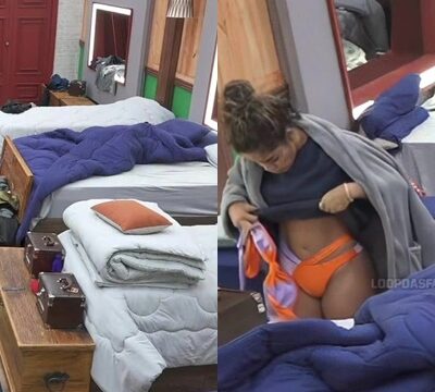 Chica joven con el coño hinchado cambiándose de ropa en el dormitorio