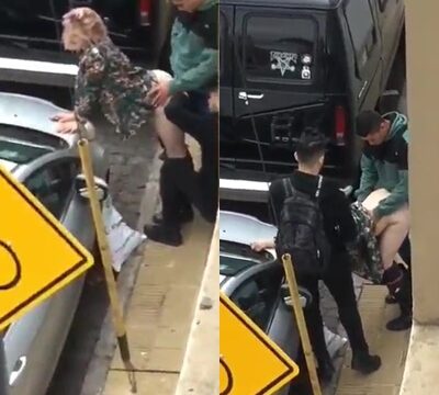 Chica joven dándosela a dos hombres en plena calle