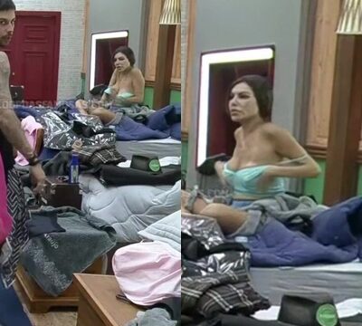 Mujer tetona cambiándose de ropa
