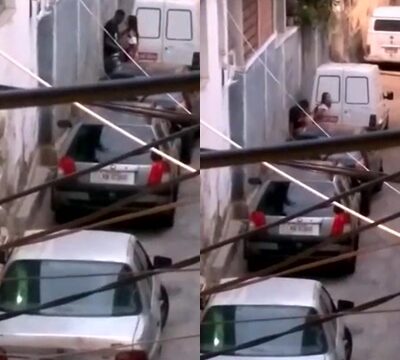 Pareja pillada practicando sexo en plena calle detrás de un coche
