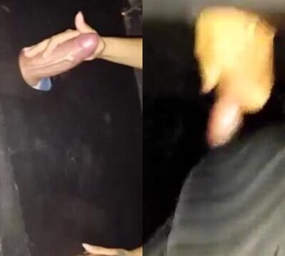 Mujer teniendo sexo con un hombre misterioso en una cabina de sexo