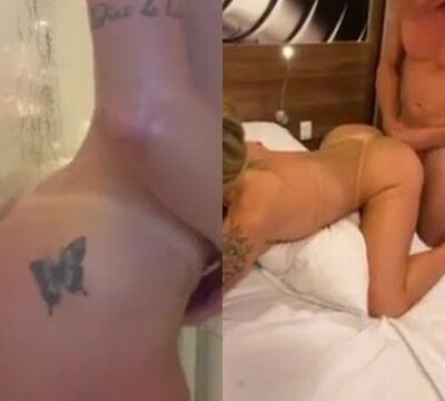 Rubia traviesa dando su coño en la cama del hotel