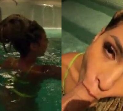 Mujer caliente en la piscina chupando polla