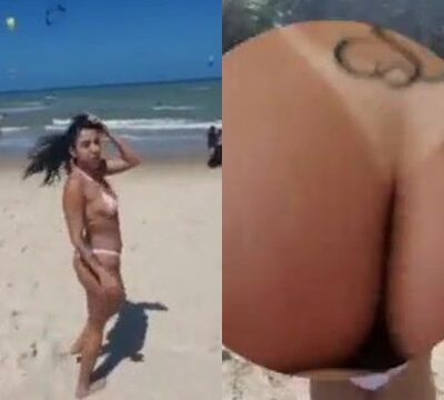 Mujer en bikini en la playa mostrando su cuerpo sexy y delicioso