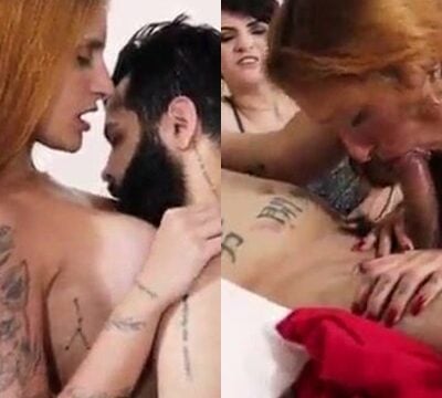 Un hombre teniendo sexo con una pelirroja y una morena