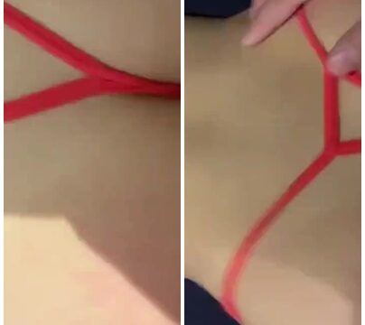 Una hermosa pelirroja dando su coño a cuatro patas en tanga