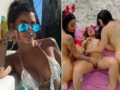Mujer y sus amigas al aire libre en un jugueteo lésbico