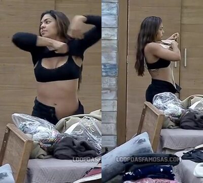 Mujer traviesa cambiándose de ropa y quedando semidesnuda