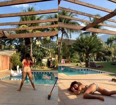 Hermosa joven bailando en pantalones cortos